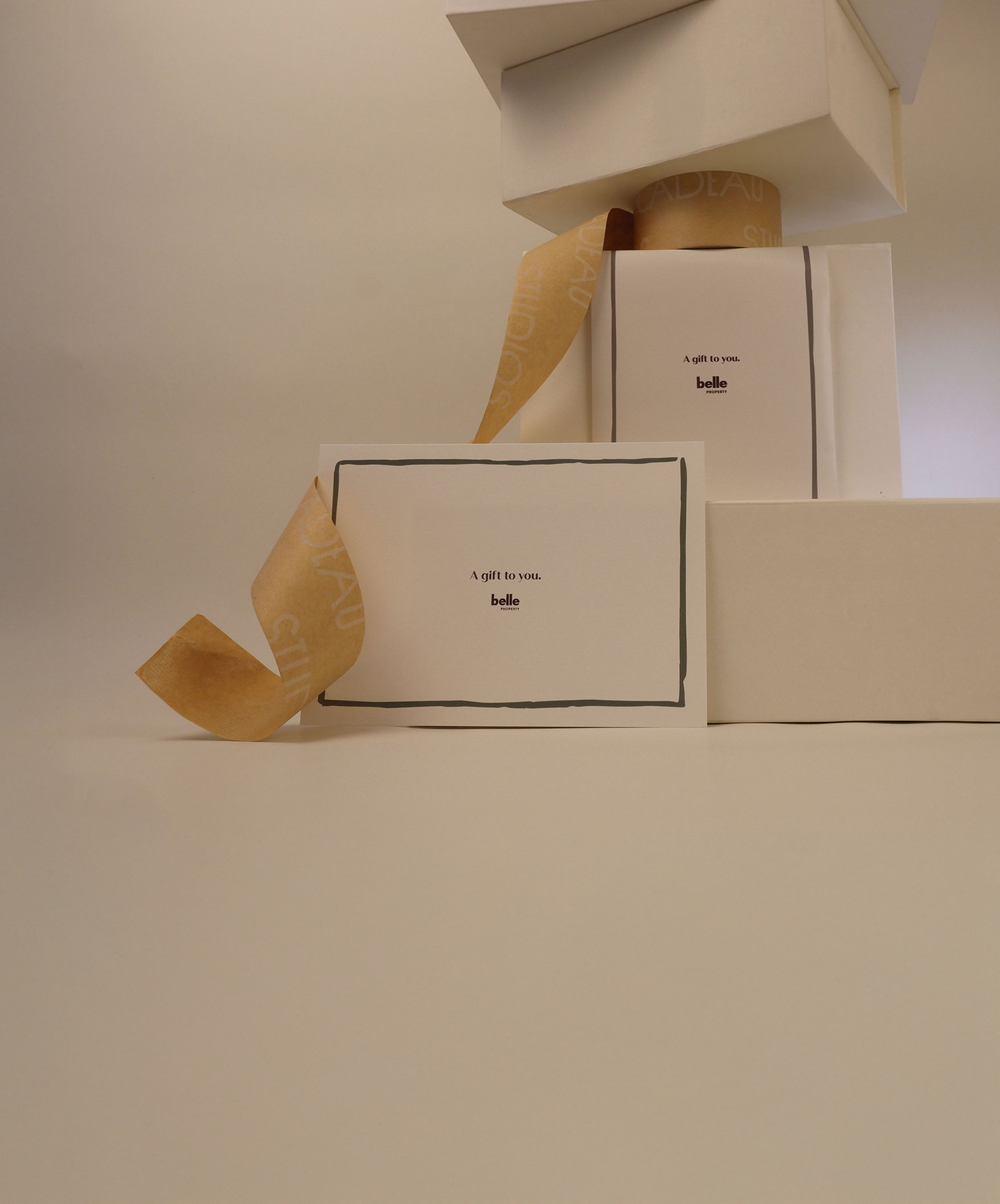 White gift box on a beige background