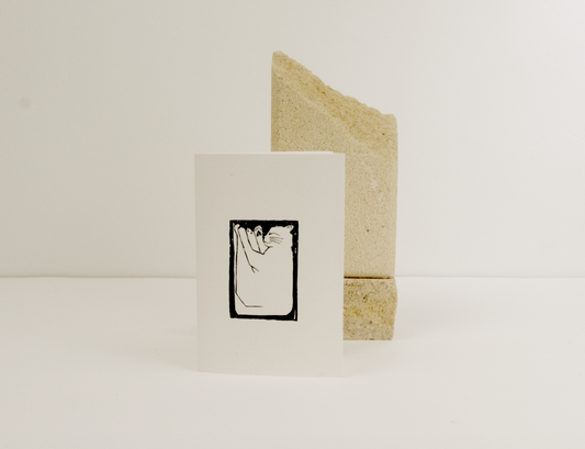 Lino print greeting card of cat sleeping 