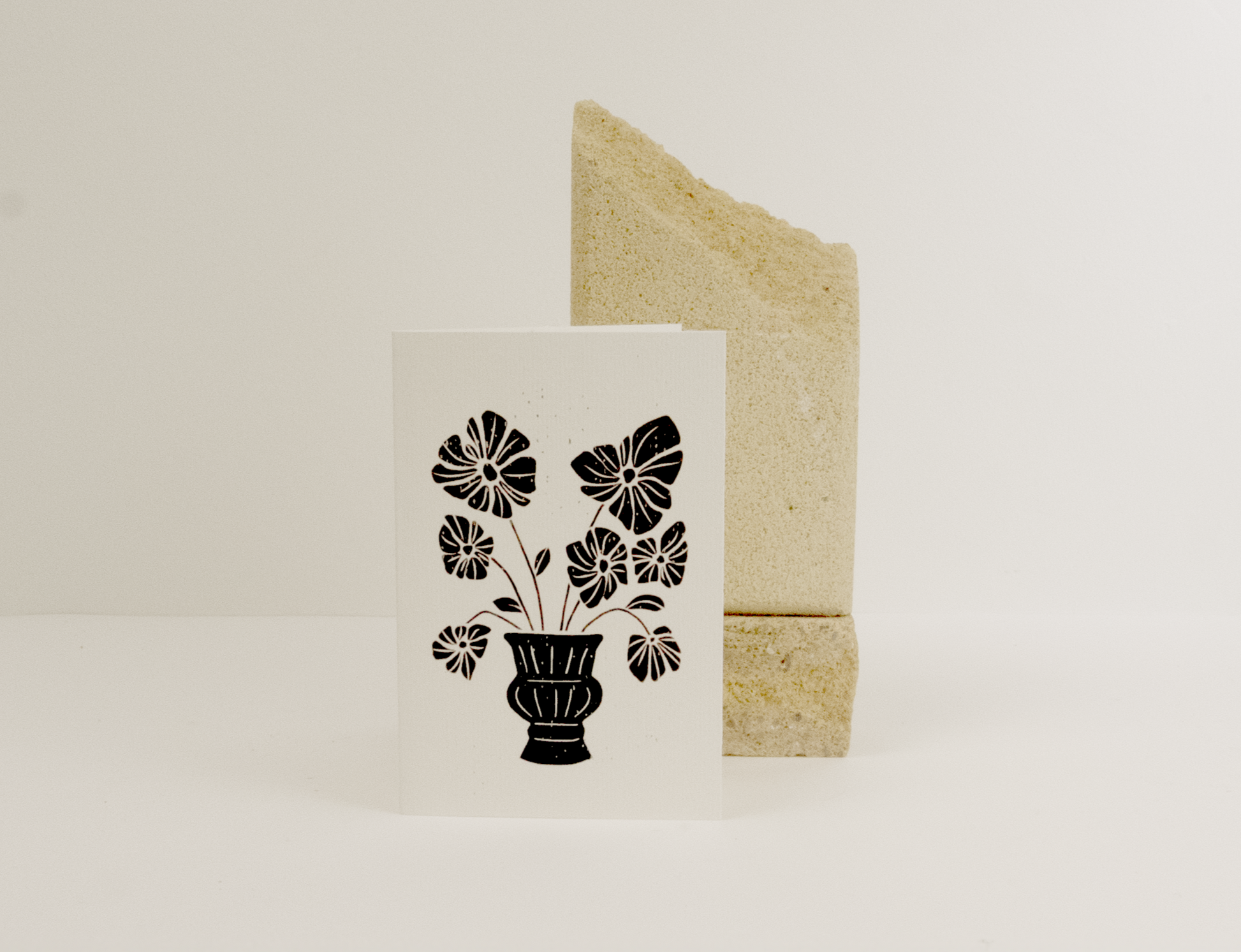 Small card with floral design against a white background