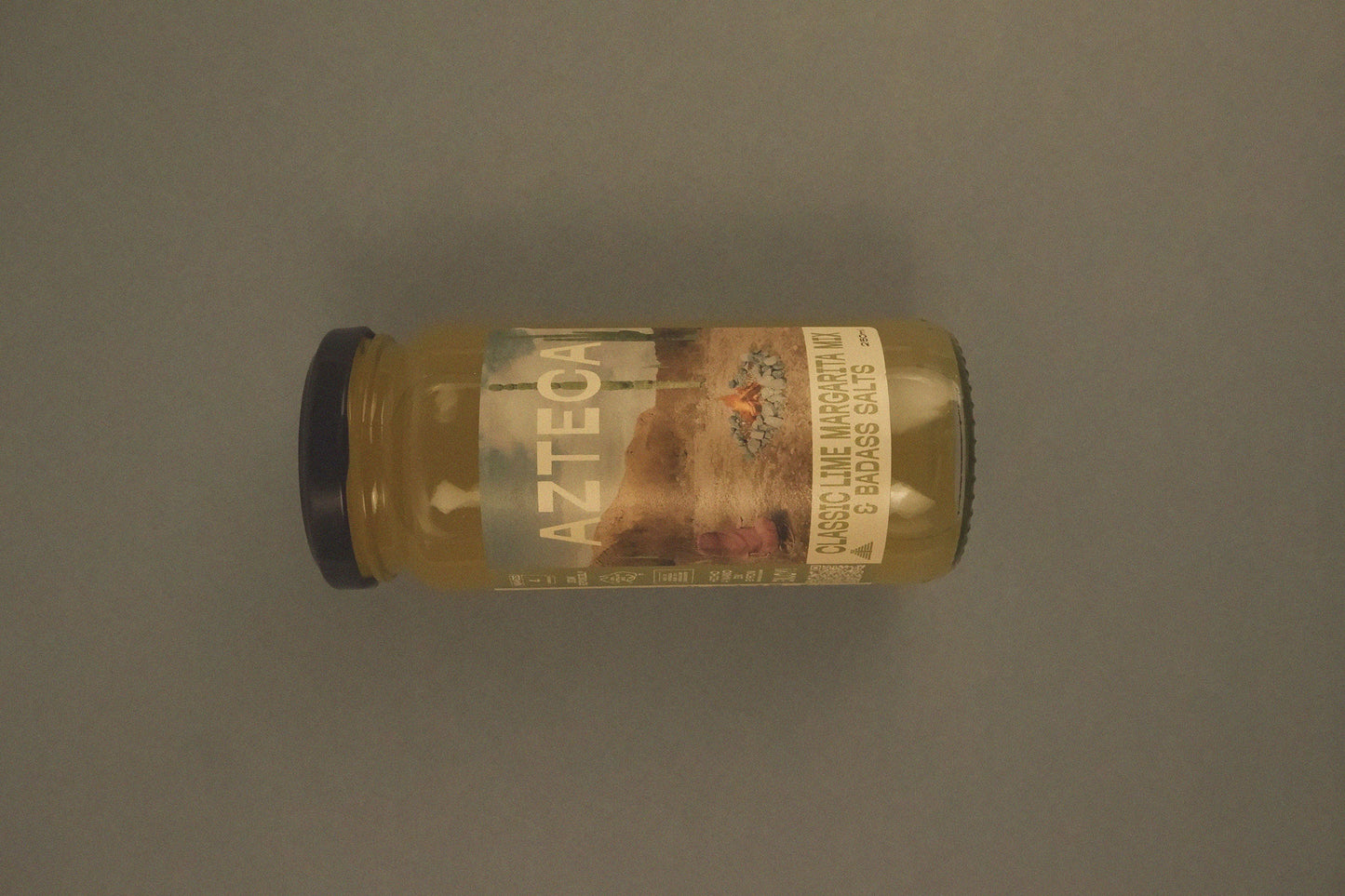Margarita jar with a label on a gray background