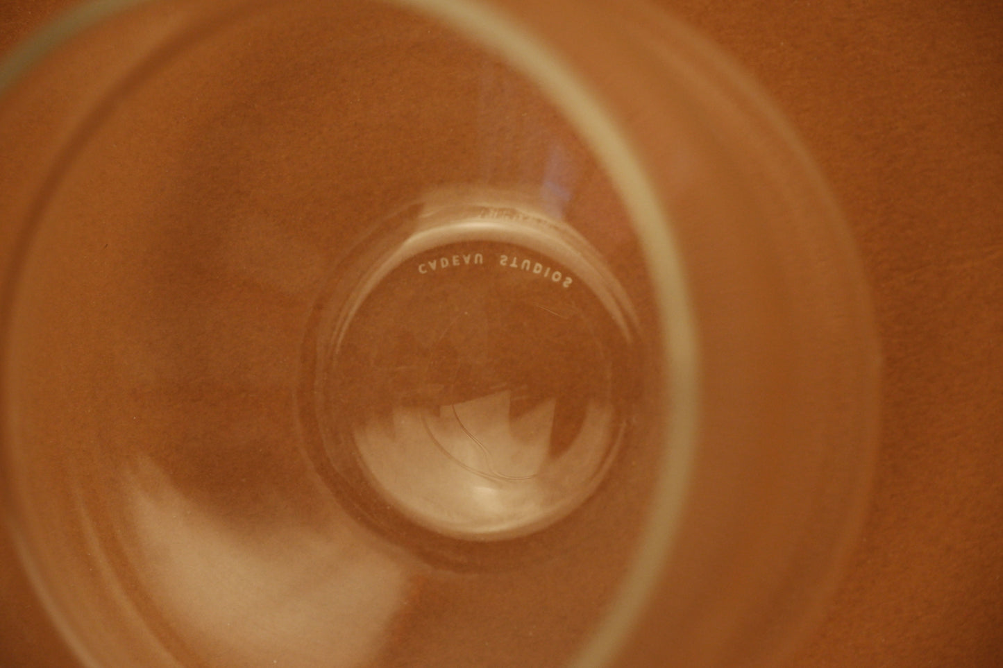 Cadeau studios logo etching on glass