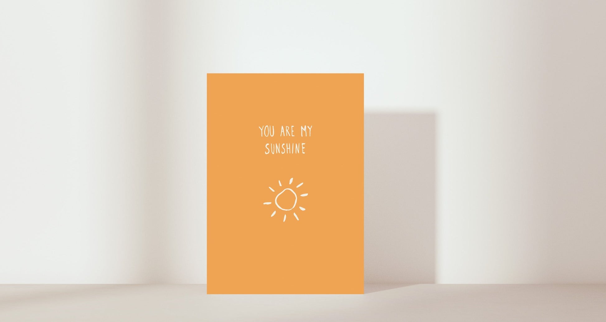 'you are my sunshine' imagery: sun. Colour: orange